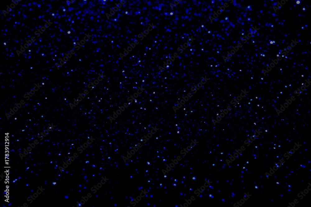 Fototapeta premium Dark Abstract Texture with Electric Blue Glitter Dust