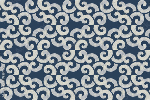 Abstract Ikat scroll or wave motifs seamless Pattern in Navy and Cream. Traditional Ikat weaving, traditional Asian scrollwork. perfect for high-end fashion textiles, coastal or modern home decor