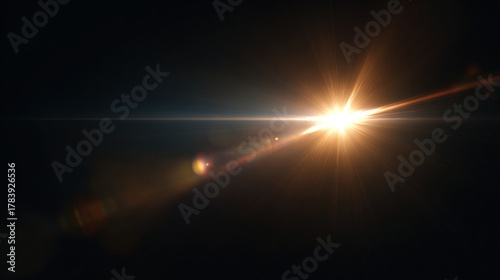 sun flare beam. golden lens flare. reflection light. starburst and glowing rays, sunlight flash on dark background. lens flare effects for design. 光