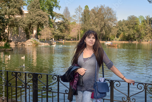 Girl at lake in Rome