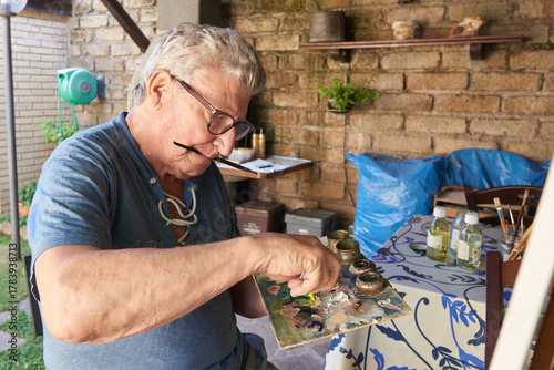 Senior Man painting
