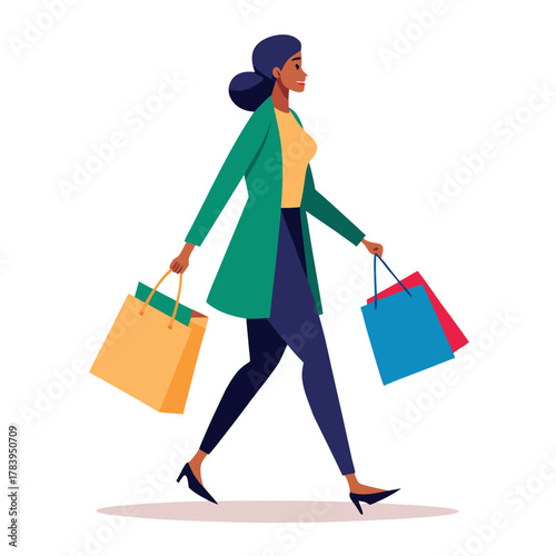 Stylish woman with dark hair happily walking with shopping bags in hand