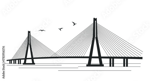 Elegant silhouette of cable stayed bridge with birds in flight