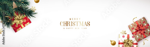 Elegant Christmas design features festive gifts, decorative ornaments, and greenery. Horizontal Christmas header for website template, flat top view.