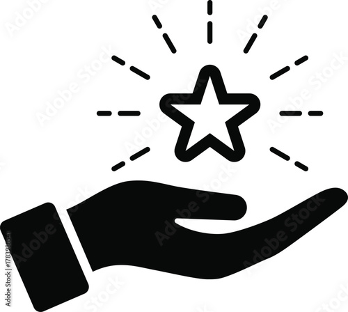 Hand holding a star, a symbol of success