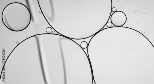 Abstract monochrome composition of oil in water. Scientific macro of cellular structure. Minimalist graphic design for beauty and skincare. Clean molecular pattern for research