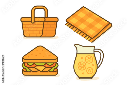 Woven picnic basket with classic food and cold lemonade pitcher