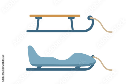 Two styles of winter sleds for snow sliding and winter recreation