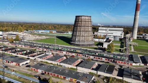 Kaunas, Lithuania — October 21, 2025: Aerial drone view of the Kaunas Thermal Power Plant complex, showing industrial buildings, pipelines and energy infrastructure in the area