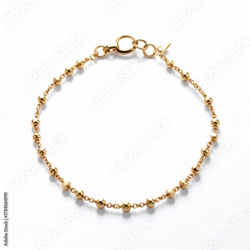 Wallpaper Mural Elegant Gold Chain Bracelet with Spherical Beads on White Background Minimalist Style Torontodigital.ca