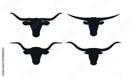 Collection of four distinct bull and longhorn head silhouettes. Versatile design assets for ranch, sport, or animal branding projects.