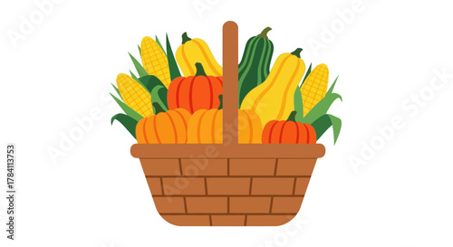 Basket filled with autumn harvest vegetables, pumpkins and corn.
