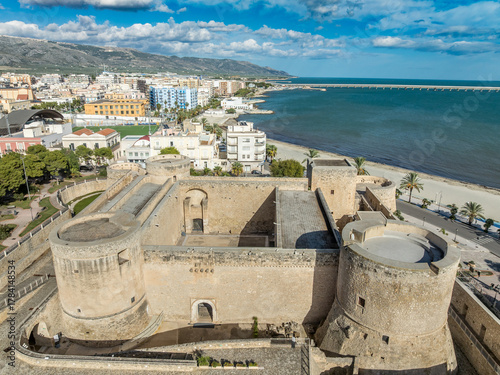 Foto Castle of King Manfred: Coastal guardian of Puglia, the formidable fortress anch