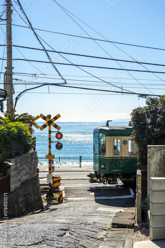 At the end of this small alley, which has been the setting for many Japanese manga and movies, you can see the train tracks and the coast.