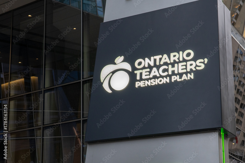 Fototapeta premium Toronto, ON, Canada - November 8, 2025: The sign of Ontario Teachers' Pension Plan is seen at 160 Front St W in Toronto, ON, Canada. The Ontario Teachers' Pension Plan (OTPP) is an independent corpora