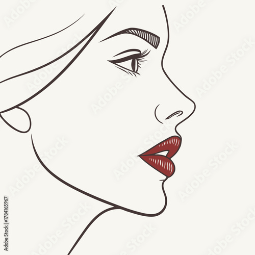 Elegant womans profile with red lips
