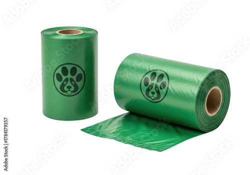 Two rolls of green dog poop bags with paw print isolated on transparent background