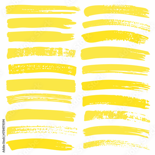 A collection of yellow hand-drawn paint brush strokes. Vector set of artistic highlighter lines and textured marks for creative design elements