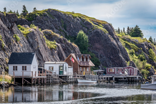 Fishing stages and boats in the Quidi Vidi harbour of St. John’s Newfoundland.  One of the stages has since burned down.