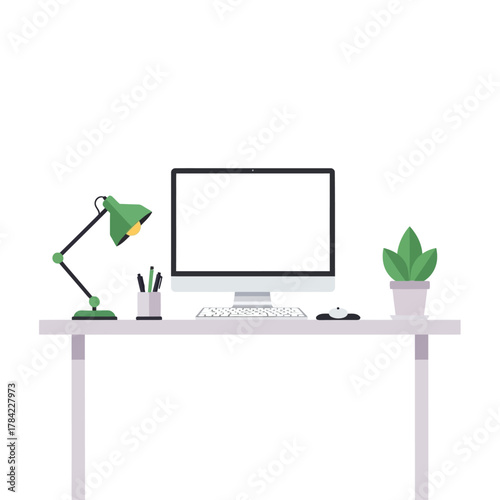 Minimalist workspace setup with computer, lamp, and potted plant on desk