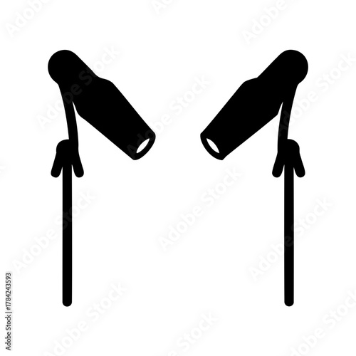 Stylized dual studio lighting setup with black silhouettes on white background