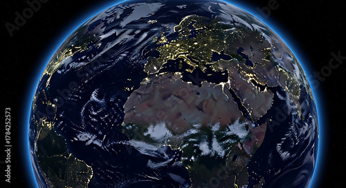 Earth seen from space at night, glowing city lights tracing continents against a dark void at night