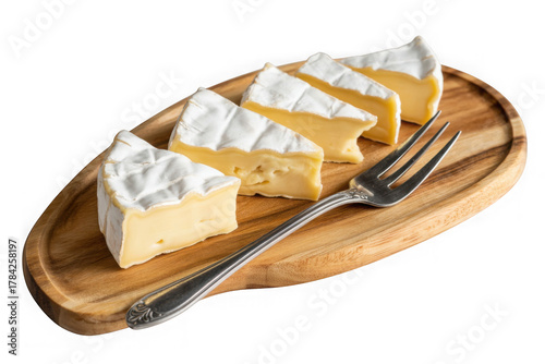 Sliced Camembert with fork on wooden cheese platter isolated on transparent background. PNG