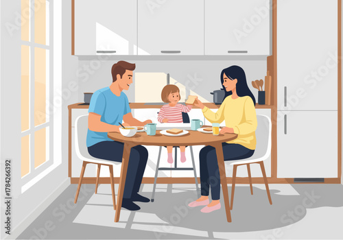 A family enjoys breakfast together in a bright and modern kitchen setting.