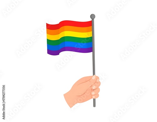 A hand holding a pride flag waving in the air