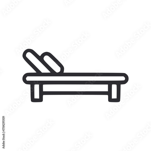 Black line art shows a daybed with pillows on top