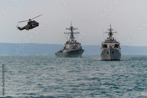 A group of patrol warships accompanied by a helicopter are carrying out a peacekeeping mission in the Black Sea.	