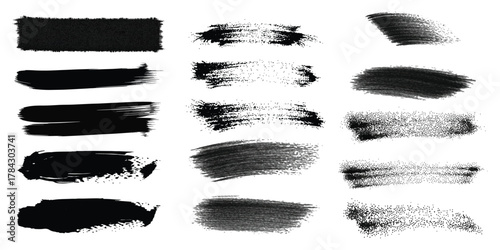 A versatile set of black grunge brush strokes and textures, featuring dry ink smears and lines, isolated vector elements for modern design.