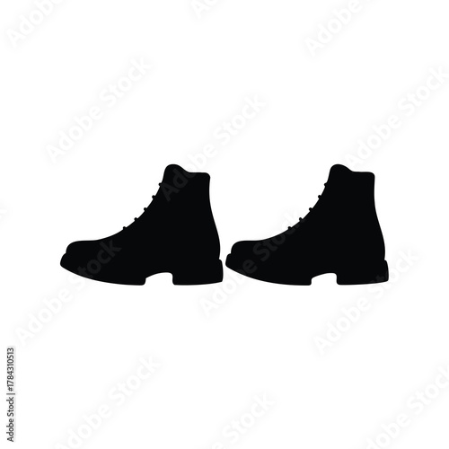 Silhouette of two lace up ankle boots on a white background