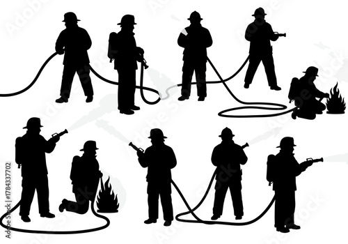 Silhouette of Firefighters Extinguishing Flames with Hoses