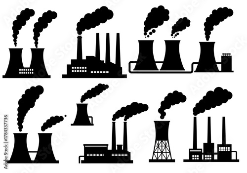 Silhouettes of industrial power plants spewing smoke, pollution from factories