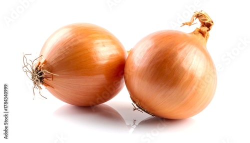 Wallpaper Mural Two round yellow onions with rough outer layers on a white surface Torontodigital.ca