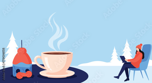 A woman wearing warm winter clothes works on her laptop outdoors in a snowy landscape, enjoying a hot beverage and cozy atmosphere.