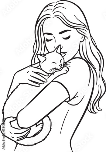 Young woman tenderly holding a small kitten