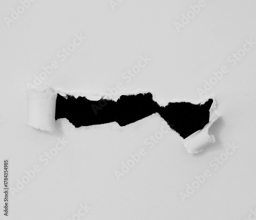 Wallpaper Mural ripped paper on black background. Torontodigital.ca