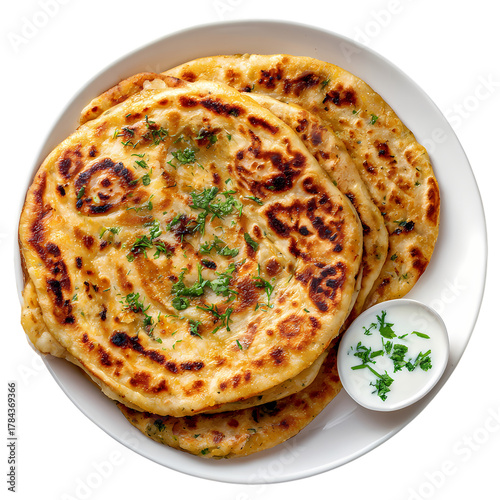 Delicious aloo paratha served with yogurt and green chilies, isolated on transparent background
