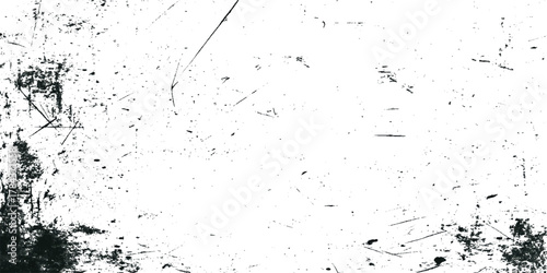 Abstract black ink splatter texture with scratches and grunge overlay on white background.