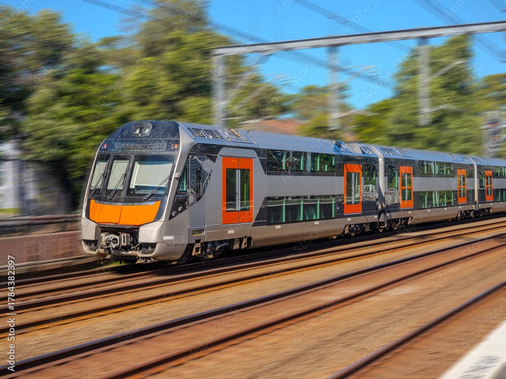 Obraz premium Passenger Train going through Summer Hill train station a suburban Sydney train Station NSW Australia