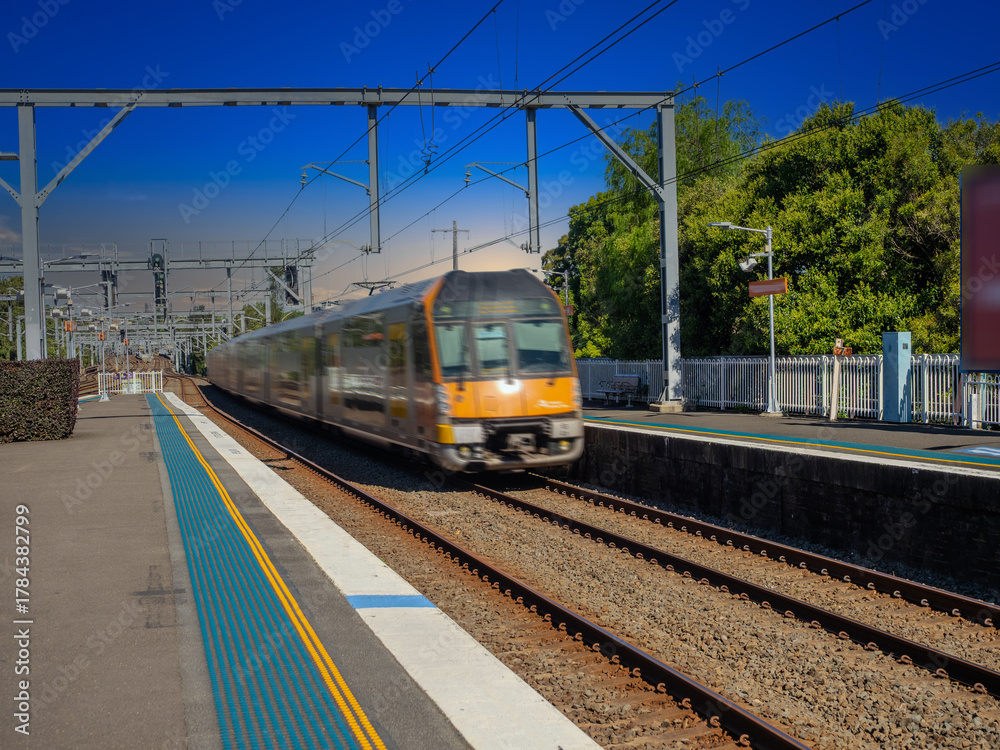 Fototapeta premium Passenger Train going through Summer Hill train station a suburban Sydney train Station NSW Australia
