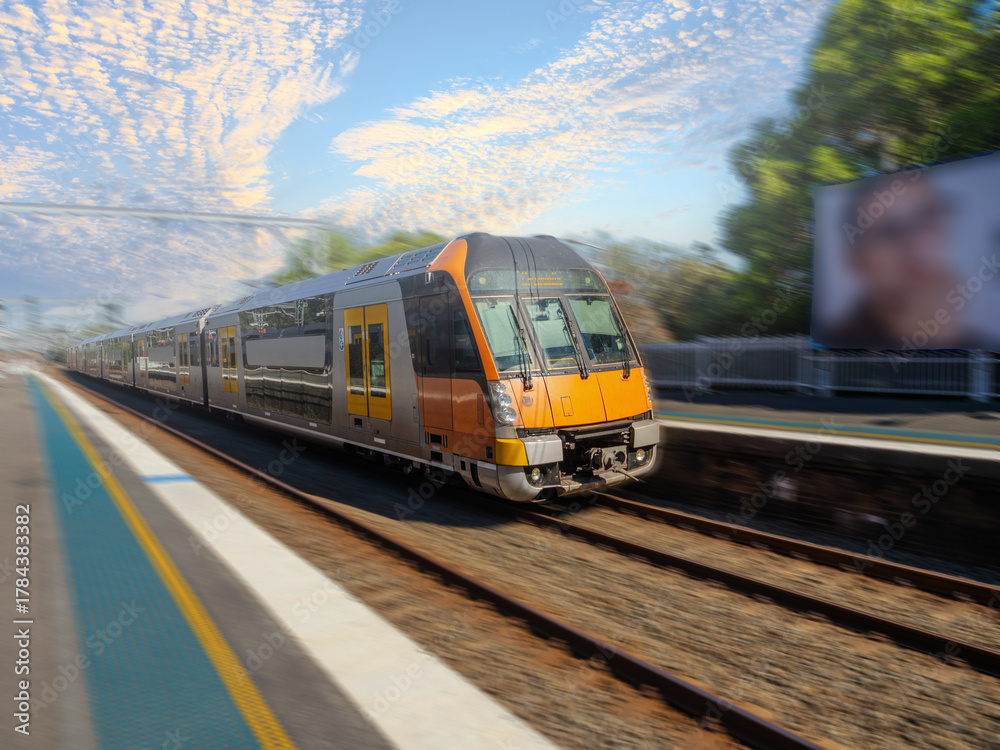 Fototapeta premium Passenger Train going through Summer Hill train station a suburban Sydney train Station NSW Australia
