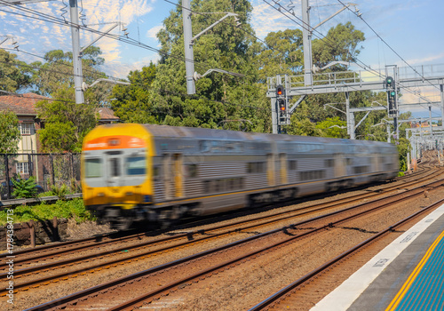 Photography Passenger Train going through Summer Hill train station a suburban Sydney train