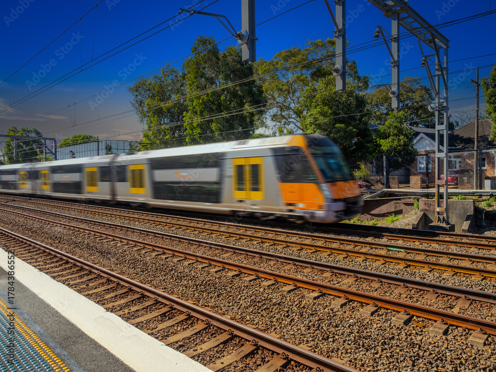 Fototapeta premium Passenger Train going through Summer Hill train station a suburban Sydney train Station NSW Australia