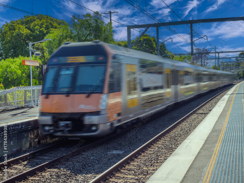 Obraz premium Passenger Train going through Summer Hill train station a suburban Sydney train Station NSW Australia