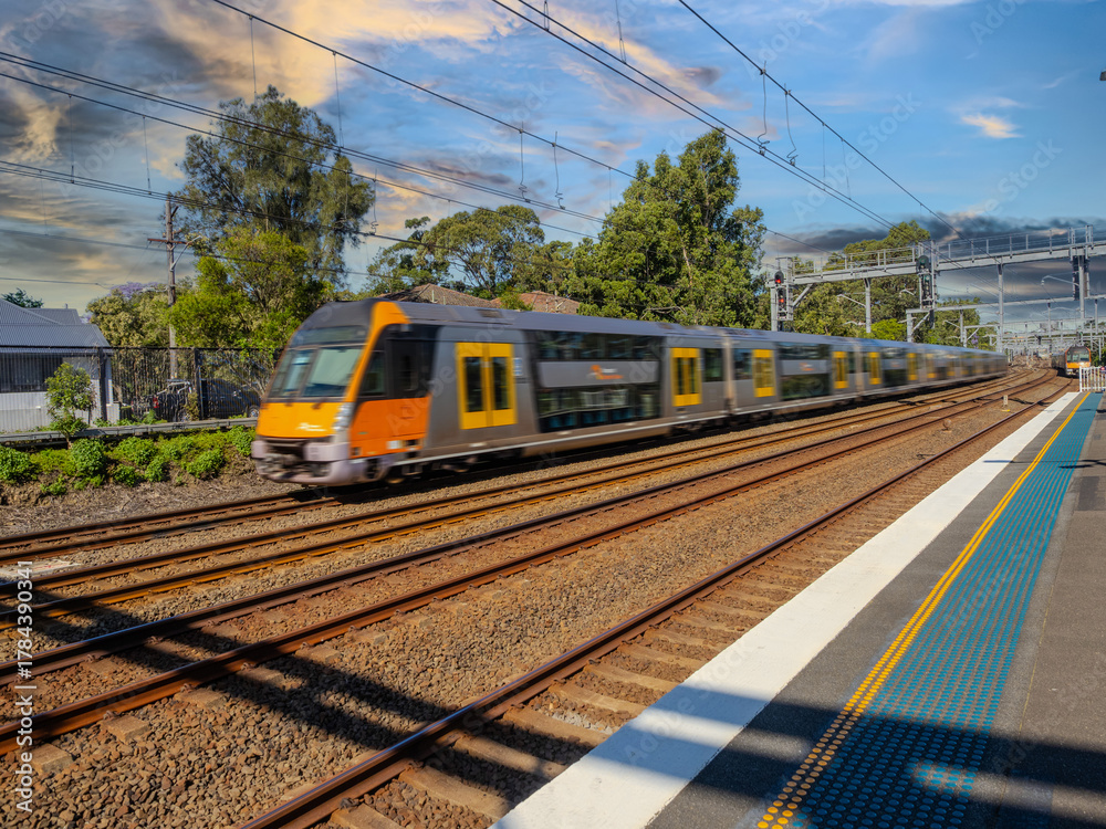 Fototapeta premium Passenger Train going through Summer Hill train station a suburban Sydney train Station NSW Australia