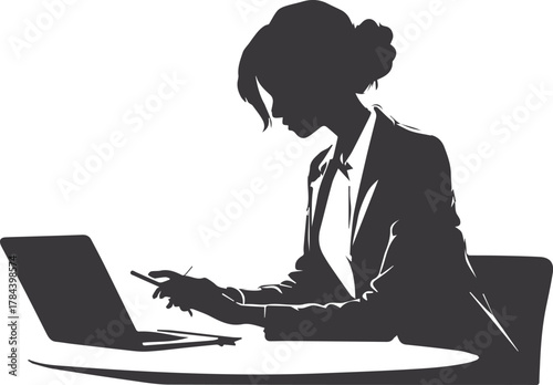silhouette of a woman working on a laptop