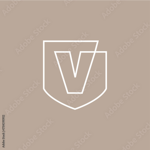 v letter shield protection security logo vector icon illustration